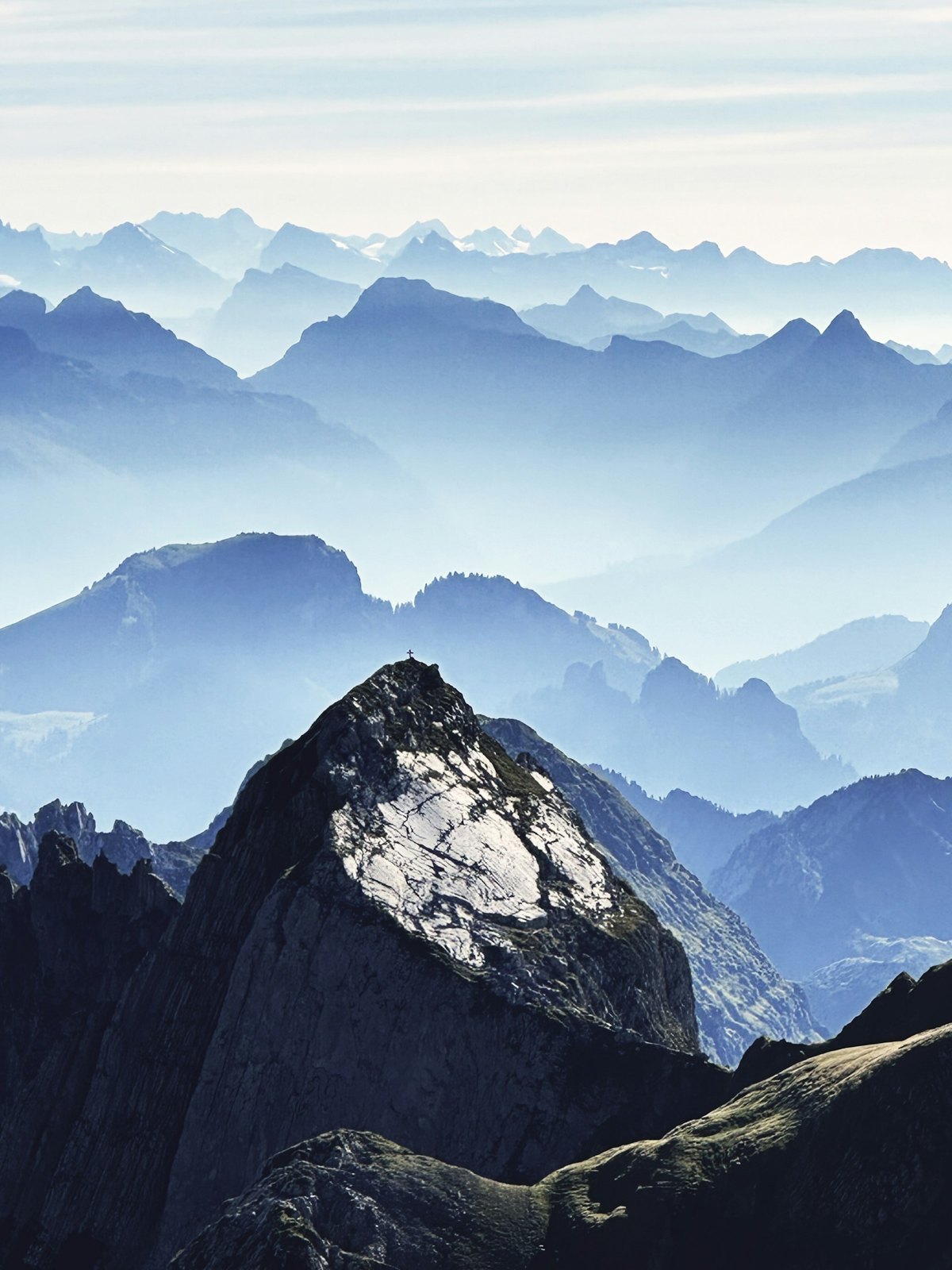 Layered Swiss Alpine peaks seen from Säntis